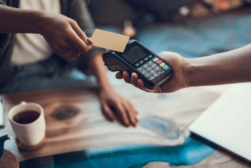 Woman paying with credit card